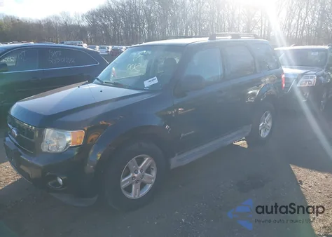 2011 Ford Escape Hybrid from USA, damaged, VIN 1FMCU5K31BKB47274